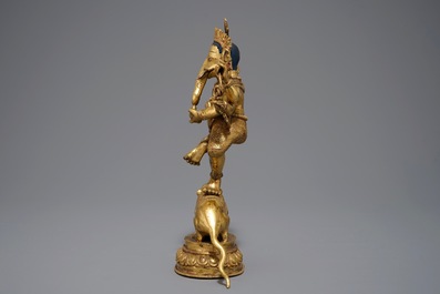 Een Sino-Tibetaanse verguld bronzen figuur van Ganesha, 19/20e eeuw