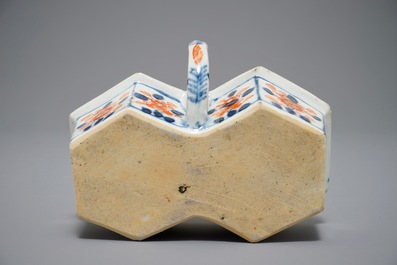 A Chinese Imari style cruet set on stand, Qianlong