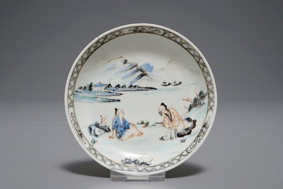A Chinese cup and saucer with two figures in a landscape, Yongzheng