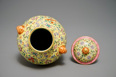 A Chinese famille rose yellow-ground vase and cover, Qianlong mark, 20th C.
