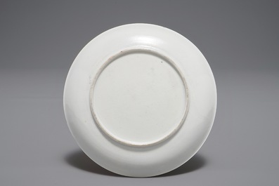 A Chinese famille rose cup and saucer depicting Lie Ti Guai with three goats, Yongzheng