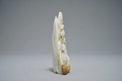 A Chinese jade carving of a mountain landscape, 20th C.