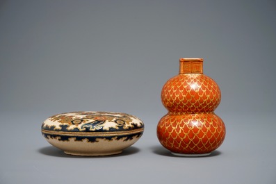 A Japanese blue and white Arita jug, Edo, 17th C., a small Kutani vase and a Satsuma box, Meiji, 19th C.