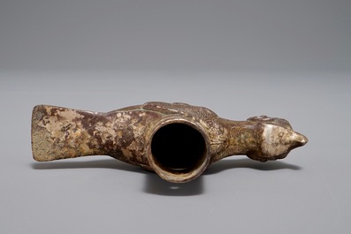 A Chinese bronze cane handle in the shape of a mythological bird, Han or later