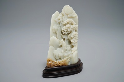 A Chinese jade carving of a mountain landscape, 20th C.