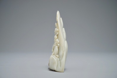 A Chinese jade carving of a mountain landscape, 20th C.