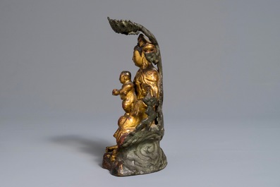 A Chinese gilt-lacquered bronze group of Guanyin with a child, 18th C.