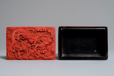 A rectangular Chinese cinnabar lacquer box and cover with dragons, 19th C.