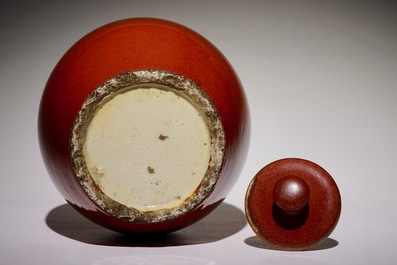 A Chinese monochrome oxblood-glazed jar and cover, 19th C.
