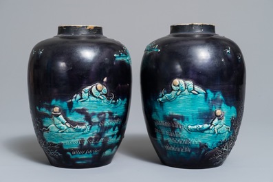 A pair of Chinese aubergine-ground Fahua jars with applied design, Kangxi