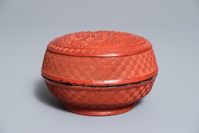 A Chinese cinnabar lacquer vase and a round box and cover, 19/20th C.