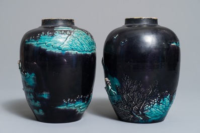 A pair of Chinese aubergine-ground Fahua jars with applied design, Kangxi