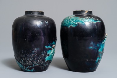 A pair of Chinese aubergine-ground Fahua jars with applied design, Kangxi