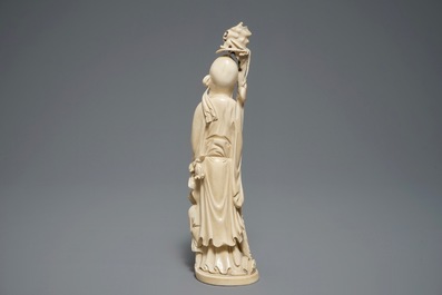 A Chinese carved ivory figure of Shou Lao, 1st half 20th C.