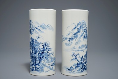 A pair of Chinese blue and white hat stands, 20th C.