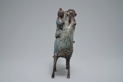 A Chinese bronze and cloisonn&eacute; incense burner shaped as a sage on a qilin, seal mark, 19th C.