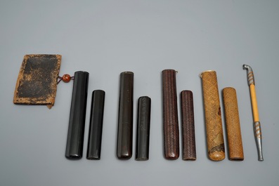 Four Japanese kiseru or tobacco pipe cases, a pipe and a pouch, Meiji, 19th C.