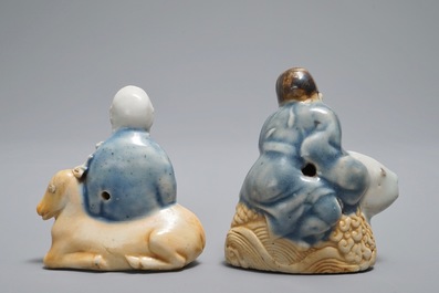 Two Chinese figurative blue and white on biscuit water droppers, Qianlong