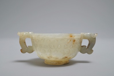 A Chinese mottled jade two-handled cup, Qing