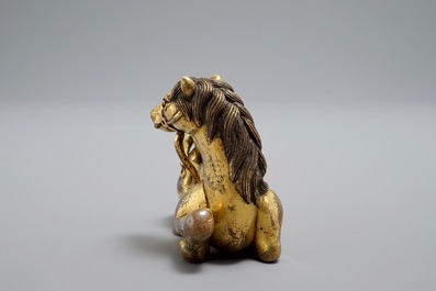 An inscribed Chinese gilt bronze model of a monkey on a horse, 19/20th C.