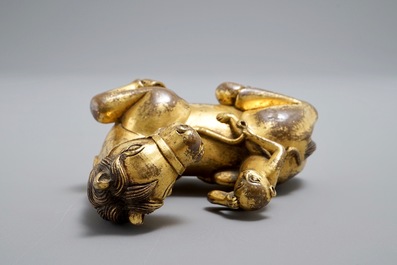 An inscribed Chinese gilt bronze model of a monkey on a horse, 19/20th C.