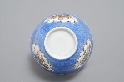A Chinese cup and saucer with roosters in grisaille on a blue ground, Yongzheng