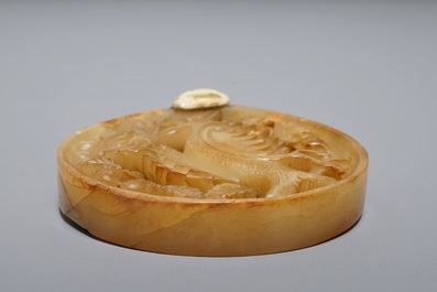 A Chinese reticulated mottled jade phoenix plaque, Ming or earlier
