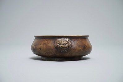 A Chinese bronze censer on wooden stand, Xuande mark, 18th C.