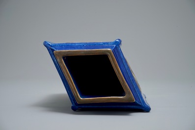 A Chinese blue-ground lozenge-shaped cong vase with taoist symbols, 19th C.