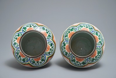 Two Chinese wucai vases with peony flowers on rockwork, 19th C.