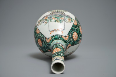 A Chinese famille verte bottle vase with fine flower baskets, 19th C.