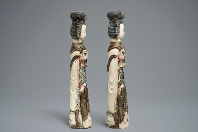 A pair of Chinese polychrome ivory figures of ladies, 1st half 20th C.