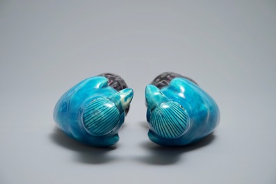 Two Chinese aubergine and turquoise-glazed models of parrots, 19th C.