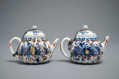 A pair of Chinese Imari style teapots and covers, Kangxi