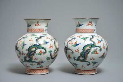 A pair of Chinese wucai dragon vases, Wanli mark, 19th C.