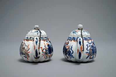 A pair of Chinese Imari style teapots and covers, Kangxi