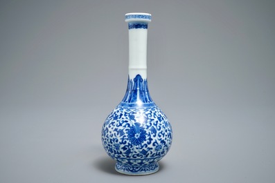 A Chinese blue and white bottle vase with floral design, Yongzheng mark, 19/20th C.