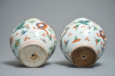 A pair of Chinese wucai dragon vases, Wanli mark, 19th C.