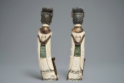 A pair of Chinese polychrome ivory figures of ladies, 1st half 20th C.