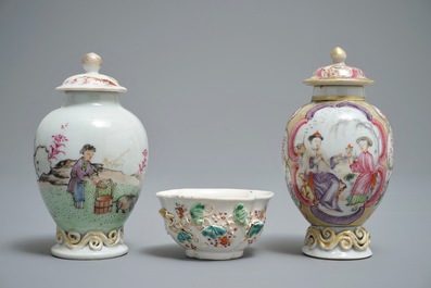 Twee Chinese famille rose theebussen en een kop en schotel met reli&euml;fdecor, Yongzheng/Qianlong