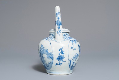 A Chinese blue and white wine jug and cover with fine design of birds and prunus branches, Transitional period