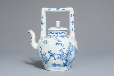 A Chinese blue and white wine jug and cover with fine design of birds and prunus branches, Transitional period