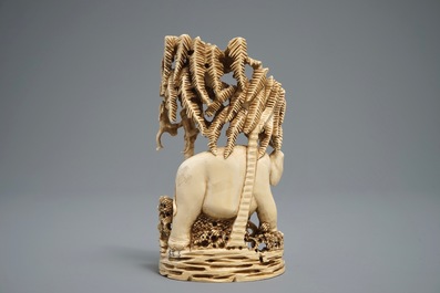 A Chinese carved ivory group of a lady with an elephant, 1st half 20th C.