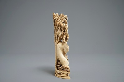 A Chinese carved ivory group of a lady with an elephant, 1st half 20th C.