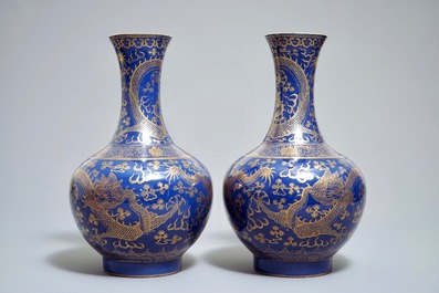 A pair of Chinese monochrome blue vases with gilt dragon design, 19th C.