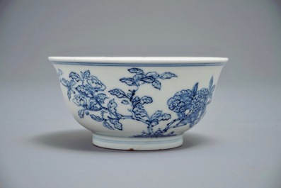 A Chinese blue and white bowl with butterflies and flowers, Yongzheng mark and of the period