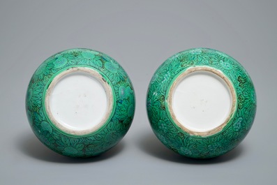 A pair of Chinese double gourd green-ground vases with squash fruit and vines, Republic, 20th C.