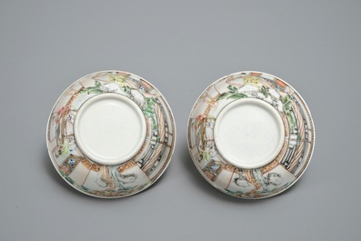 A pair of fine Chinese famille rose cups and saucers with figures in a garden, Yongzheng/Qianlong