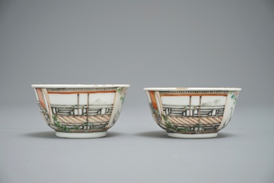 A pair of fine Chinese famille rose cups and saucers with figures in a garden, Yongzheng/Qianlong