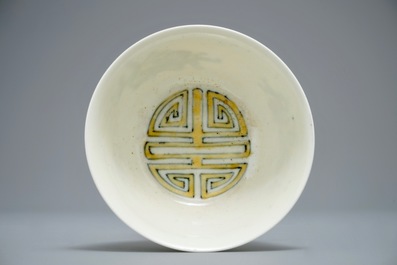 Three Chinese plates with dragons and phoenixes and an underglaze decorated bowl, Kangxi and Guangxu marks, 19/20th C.